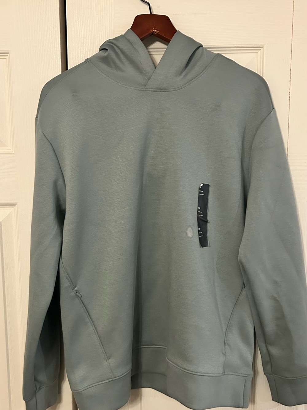 all in motion Men's Hooded Pullover Sweatshirt in Sage Green with imperfection